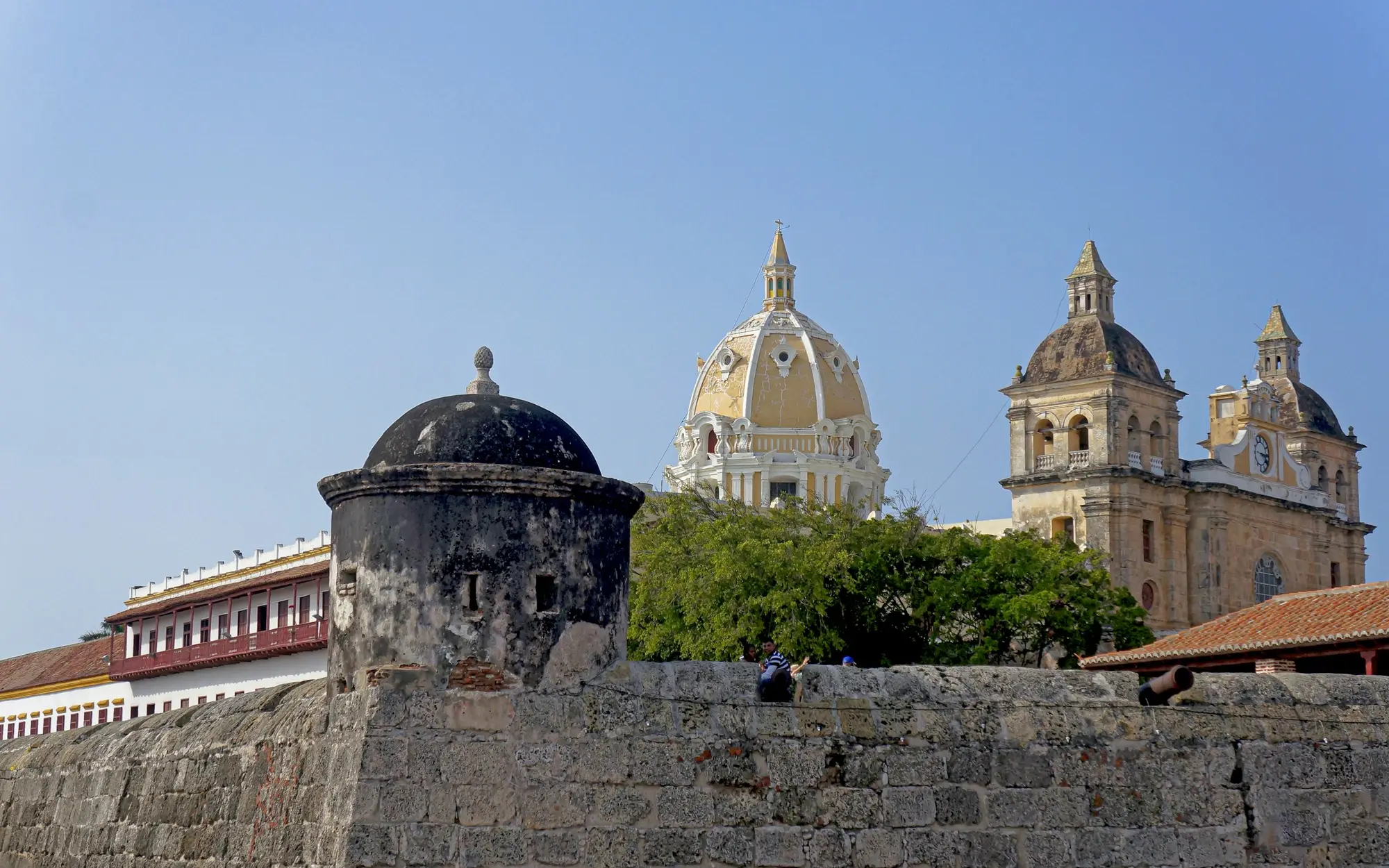 Church domes rising above the colonial wall of Cartagena